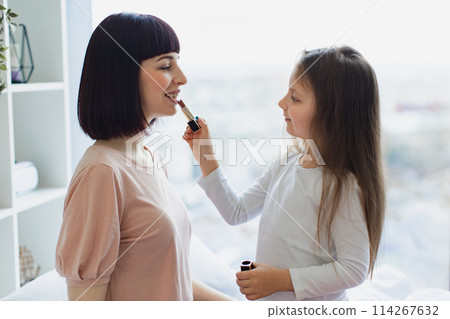 Happy Mother and daughter having fun together at weekend. Happy Mother and daughter having fun together at weekend. 114267632