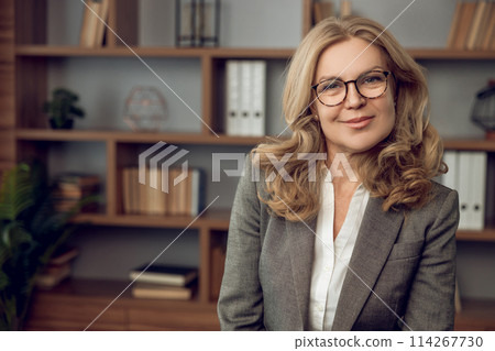 Confident female psychologist in formal wear in modern office 114267730