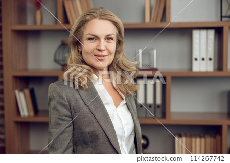 Woman psychologist in modern office providing psychotherapy services 114267742