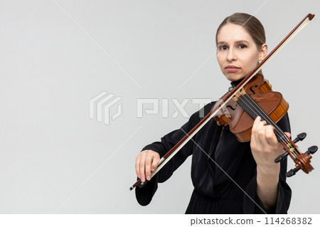 Woman professional violist playing musical instrument 114268382