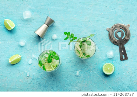 Mojito cocktail. Summer cold drink with lime, fresh mint, and ice. Cool beverage 114268757