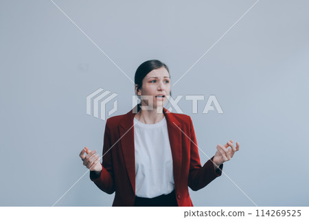 Young woman has headache, isolated on gray background. Young woman has headache, isolated on gray background. 114269525