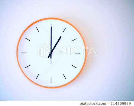 Isolated on white background Minimalist style wooden wall clock, showing time at 1.00 or 13.00 114269959