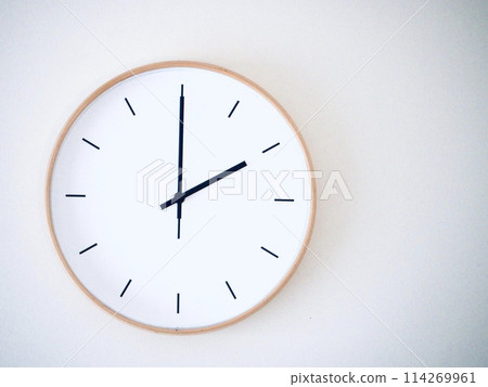 Isolated on white background Minimalist style wooden wall clock, showing time at 2.00 or 14.00 114269961