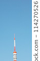 The tip of Tokyo Tower shining against the blue sky 114270526