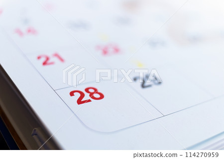 Calendar page showing holiday event Calendar page showing holiday event 114270959