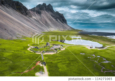 Abandoned icelandic viking village on wilderness near Vestrahorn mountain during summer at Stokksnes peninsula, Iceland Abandoned icelandic viking village on wilderness near Vestrahorn mountain during summer at Stokksnes peninsula, Iceland 114271065