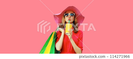 Portrait of beautiful young woman model with colorful shopping bags drinking juice in summer hat Portrait of beautiful young woman model with colorful shopping bags drinking juice in summer hat 114271966
