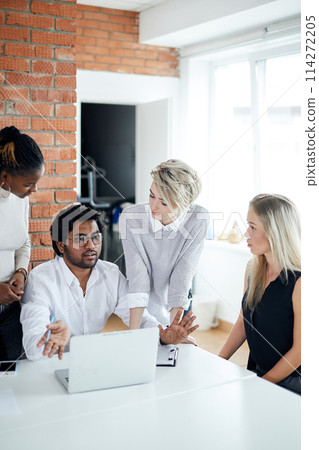 collaborating serious people at work 114272205