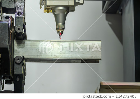 Close up scene the fiber laser cutting machine cut the square shape stainless steel tube . Close up scene the fiber laser cutting machine cut the square shape stainless steel tube . 114272405