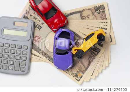 A miniature car whose body was deformed in an accident and some money A miniature car whose body was deformed in an accident and some money 114274500