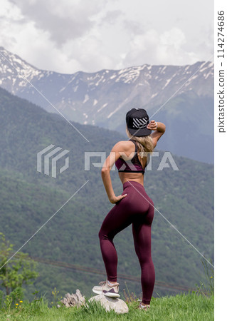 Exercising fitness woman doing exercises in nature. Fit female Asian Caucasian athlete sport model 114274686