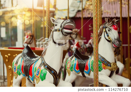 Vintage retro carousel horse. Children's attraction in the old park.Childhood memories. 114276710