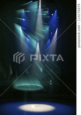 Vertical background of multi-colored lighting from stage spotlights. Vertical background of multi-colored lighting from stage spotlights. 114276879