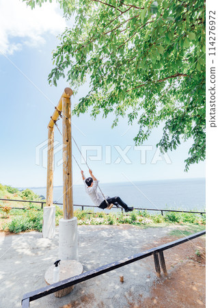 [Shizuoka Prefecture] ACAO FOREST in Atami, a photogenic spot for social media: A man enjoying a flying swing 114276972