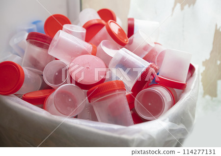 Lots of empty medical urine containers.Medical banks. 114277131