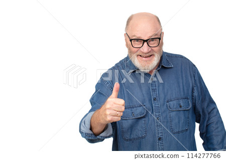 Portrait of an attractive gray-haired man in a denim shirt showing a class sign isolated on a white background. Bearded grandfather of the European type is cheerful and happy. 114277766