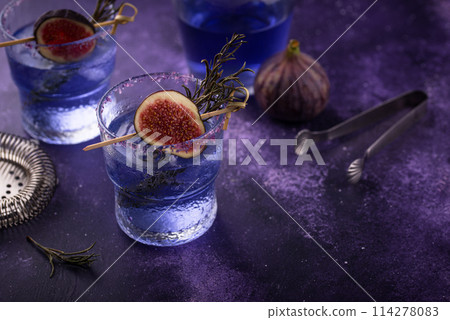 Purple fig cocktail or mocktail in glass 114278083