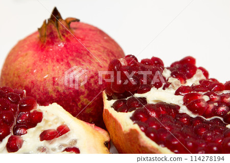 Purified pomegranate fruit on a white background 114278194