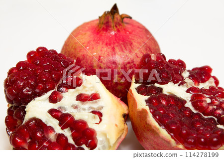 Purified pomegranate fruit on a white background 114278199