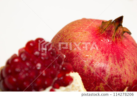 Purified pomegranate fruit on a white background 114278206