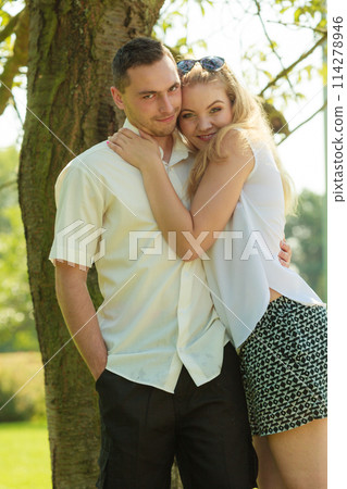Happy couple having romantic date in park Happy couple having romantic date in park 114278946