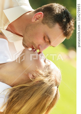 Happy couple having romantic date in park 114278955