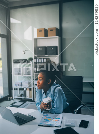 Sad tired young asian lady thinking, sleep at laptop, suffering from overwork, stress in room interior. Deadline, problems in study, work, business, freelance at home new normal with tech Sad tired young asian lady thinking, sleep at laptop, suffering from overwork, stress in room interior. Deadline, problems in study, work, business, freelance at home new normal with tech 114279039