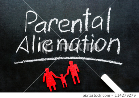 Parental alienation. Chalk inscription on a blackboard and family figures. Parental alienation. Chalk inscription on a blackboard and family figures. 114279279