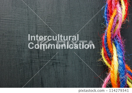 Intercultural communication concept. Multi-colored threads twisted into one rope. Intercultural communication concept. Multi-colored threads twisted into one rope. 114279341