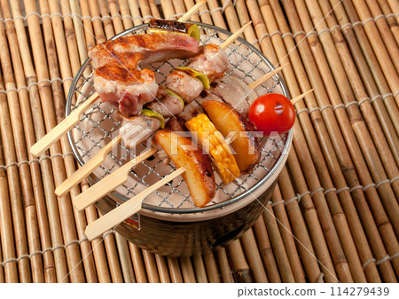 Japanese skewered seafoods vegetables Japanese skewered seafoods vegetables 114279439