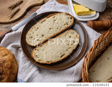 Slices of crusty bread Slices of crusty bread 114280141