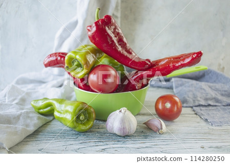 fresh ripe assorted vegetables for cooking dinner on a wooden rustic table 114280250