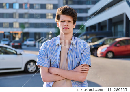Portrait of college student guy looking at camera, urban outdoor Portrait of college student guy looking at camera, urban outdoor 114280535