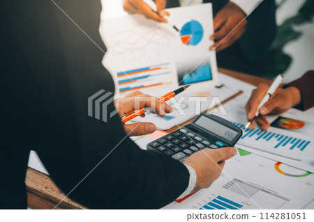 Business team working with new startup project plan and discussion information for financial strategy with laptop and digital tablet in a modern business lounge. 114281051