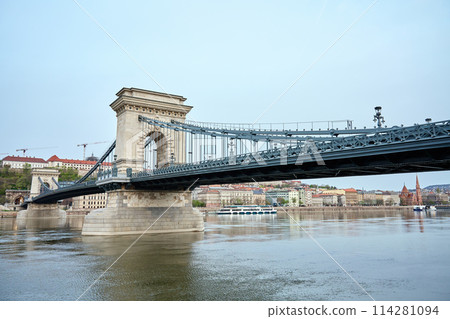 Panoramic view on skyline of Budapest city with Chain Bridge along Danube River. Architecture of capital of Hungary with historical buildings and famous landmarks 114281094