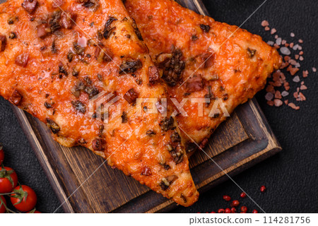 Slices of delicious street pizza with sausage, mushrooms, tomatoes and cheese 114281756