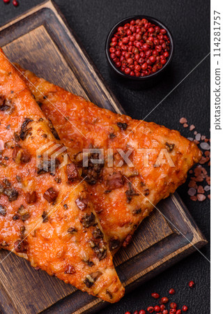 Slices of delicious street pizza with sausage, mushrooms, tomatoes and cheese 114281757