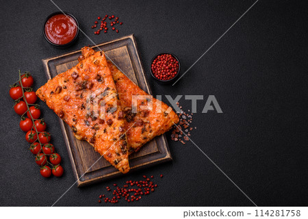 Slices of delicious street pizza with sausage, mushrooms, tomatoes and cheese 114281758