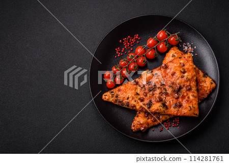 Slices of delicious street pizza with sausage, mushrooms, tomatoes and cheese 114281761