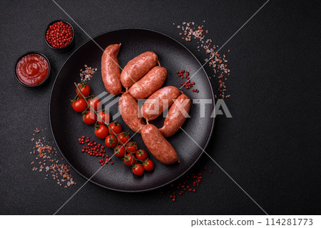 Baked chicken or pork sausages, salt, spices and herbs 114281773