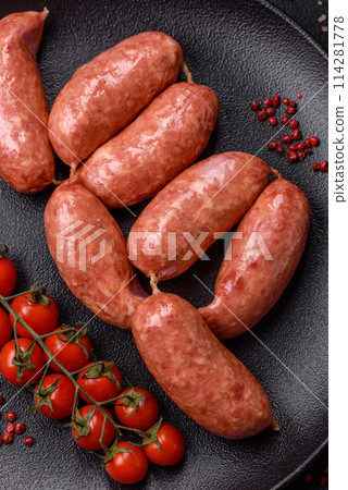 Baked chicken or pork sausages, salt, spices and herbs Baked chicken or pork sausages, salt, spices and herbs 114281778