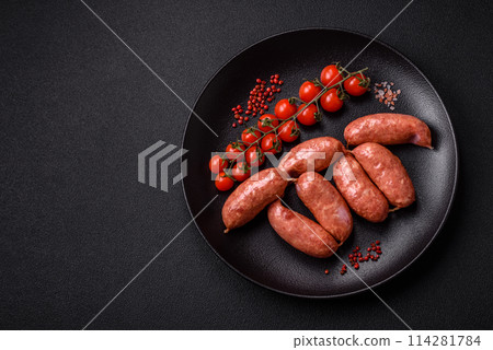 Baked chicken or pork sausages, salt, spices and herbs 114281784