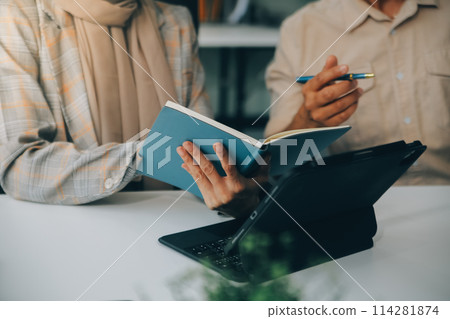 Finance manager meeting discussing company growth project success financial statistics, professional investor working start up project for strategy plan with document, laptop and digital tablet. 114281874