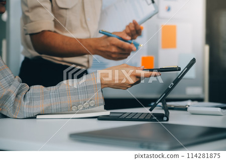 Finance manager meeting discussing company growth project success financial statistics, professional investor working start up project for strategy plan with document, laptop and digital tablet. 114281875