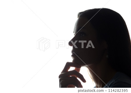 Portrait of a young woman, side view Portrait of a young woman, side view 114282395