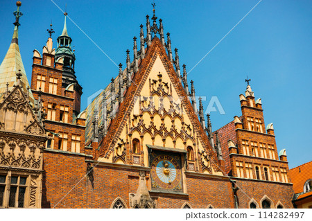 Museum of Bourgeois Art. Clock at the Town Hall Square in Wroclaw, Poland. Polish landmark in the historic center of town Museum of Bourgeois Art. Clock at the Town Hall Square in Wroclaw, Poland. Polish landmark in the historic center of town 114282497