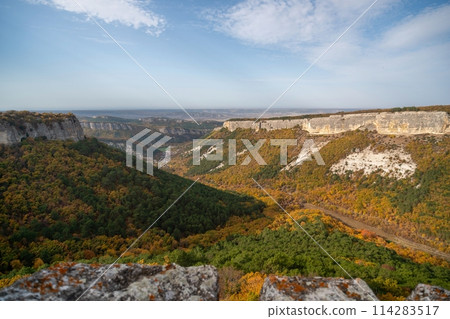 The autumn landscape of the mountain valley is an amazing, beautiful place at any time of the year. Hiking. Nature The autumn landscape of the mountain valley is an amazing, beautiful place at any time of the year. Hiking. Nature 114283517