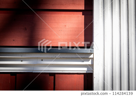 Wooden building details and construction. Red and white color 114284139