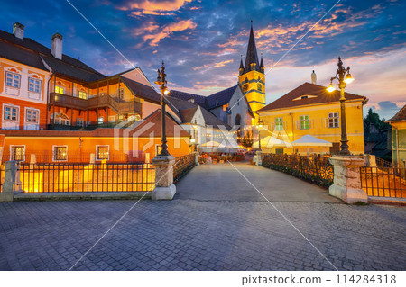 Amazing View of Evangelical Cathedral and the Liars Bridge in the center of Sibiu city. Amazing View of Evangelical Cathedral and the Liars Bridge in the center of Sibiu city. 114284318
